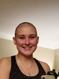 We just didn't want her to be alone.' Sisters shave their heads to support  friend with cancer