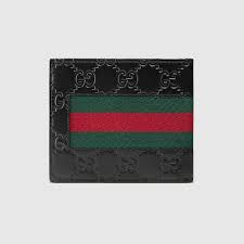 Introducing the gucci wallets for men, the signature web stripe motif can be found on key favorites as well as gucci's gg pattern embossed on its smooth and tumbled leather wallets. Striped Gucci Mens Wallet Off 63 Www Ncccc Gov Eg