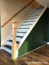 Make a mounting block from 3/4 plywood or a 2x6 to fit inside of the bottom of the box newel. Lake House Basement Project Update Ten Installing A Newel Post Sweet Pea