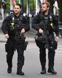 Metropolitan Sco19 Afo S On Patrol In London Sourc Men In Uniform Military Gear Special Forces Police Uniforms