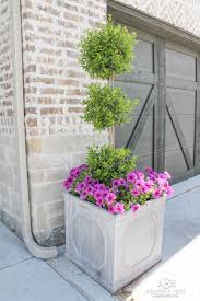 Another idea is to paint three pots an arresting cerulean blue and paint welcome, on the largest. Front Porch Outdoor Planter Ideas You Ll Love A Blissful Nest