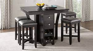 Find the perfect home furnishings at hayneedle, where you can buy online while you explore our room designs and curated looks for tips, ideas & inspiration to help you along the way. Picture Of Ellwood Black 5 Pc Bar Height Dining Set From Furniture Black Dining Room Sets Pub Table Sets Dining Room Sets