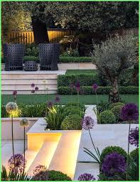 50 Decor Modern Landscaped Garden With Round Box Hedges Multiple Levels And Agapanth Moderne Landschaftsgestaltung Moderne Gartenentwurfe Gartendesign Ideen