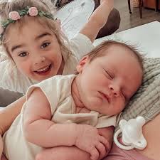 THREE WEEKS OLD • How?! Thinking of how big he is already getting is just  wild to me… newborn clothes are already so snug!! We're moving right along  into 0-3 months!