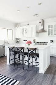Grey floor, wood countertop, white cabinets. Kitchen Ideas With Gray Floors Brainly