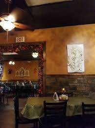 Inside Decor Of Stefano S Is A Dim Lighted Dining Room With Good Food And Service Come He Florence Restaurants Kid Friendly Restaurants Inside Decor