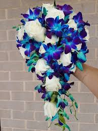 Wedding bouquet, white tropical bouquet, tropical bouquet, beach wedding bouquet, orchid bouquet, silk wedding bouquet, lily bouquet. A Wired Tear Drop Bouquet Of White Roses With Blue Singapore Orchids Orchid Bouquet Wedding Blue Orchid Wedding Flower Bouquet Wedding