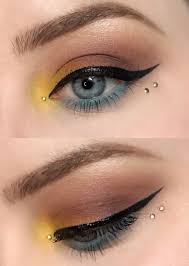 Black And Blue Inner Corner Of Eye Colorful 3 Tone Eye Makeup Look With Rose Eyeshadow Brown Eyeshadow Yellow Inner Corner Highlight Blue Waterline Eye Makeup Blue Eye Makeup Black Eye Makeup