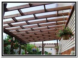Clear Roof Panels For Pergola Jpg 676 506 Pixels Large Expanse Broken Up By Wood Supports Snow Weight Too Pergola Patio Pergola With Roof Pergola Plans