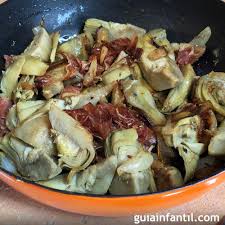 .de cocinar alcachofas ya que el horno se encarga de todo y quedan riquísimas además de que se aprovecha el máximo de ellas ya que se cocinan ingredientes para hacer la receta de alcachofas al horno: Alcachofas Con Jamon Receta Para Ninos Rapida Y Sana