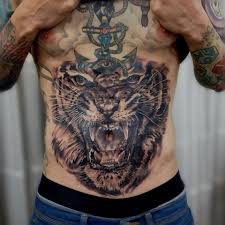 Scopri ricette, idee per la casa, consigli di stile e altre idee da provare. Tatuaje Realista De Un Tigre En El Estomago Tatuaje En La Panza Tatuaje De Cabeza De Tigre
