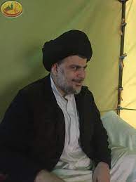 صور السيد القائد مقتدى الصدر في خيم الاعتصام داخل المنطقة الخضراء newsboy fictional characters hats