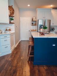 White kitchen with dark floor. White Cabinets Navy Island And Dark Wood Floors Dark Wood Floors White Cabinets Cabinet
