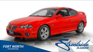 Image result for Medium Red 2004 Pontiac