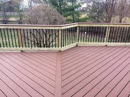 Skip the stain aisle and instead live life outdoors with the simple choice in composite decking. Decking In Trex Select Saddle With Black Deckorator Balusters Ashburn Va