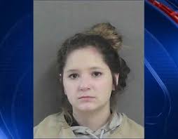 Police: Woman arrested for hitting dog with frying pan