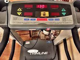 The page provides a catalogue of brands and devices, each offering to view or download an updated manual. Trimline 7600 One Treadmill For Sale In Stockton Ca Offerup