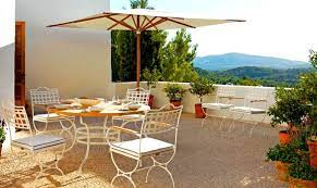 These chairs are hand wrought, and very unusual. 10 New Ways To Think About Wrought Iron For The Garden Or Patio