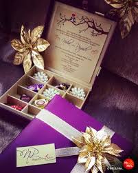 Plus, diy decorations make great keepsakes from your special day. Photo Of Purple And Gold Invitation Box Indian Wedding Invitation Box Box Wedding Invitations Indian Wedding Invitations