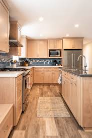 Wood is available in many different colors, shades, and species (tree type), providing a wide range of harking back to the '60s, tall natural wooden cabinets can bring a vintage vibe to your modern cooking space. Coastal Contemporary Custom Kitchen Cabinets In Morro Bay California Sligh Cabinets Inc