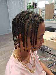 The secret to this trendy bear style with beads is using as many metal and plastic beads as you can. Box Braids Men Beads Novocom Top