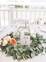 Can T Get Enough Of The Flowers In This Beach House Wedding Flower Centerpieces Wedding Wedding Floral Centerpieces Terrarium Wedding
