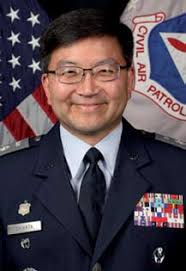 CAP cadets guide the T-Rex balloon at the annual Hollywood Christmas Parade