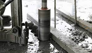 Core drilling is a process that uses a specialized drill bit with a hollow center to cut into concrete, reinforced concrete, masonry, stone or other types of very hard construction aggregate. Concrete Company In Edmonton Stone Concrete Cutting Coring