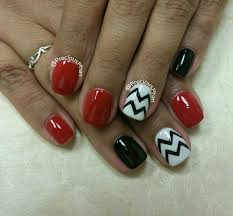 These red nails design will complete your look and will make you feel like the whole world is at your feet. Black White And Red Nails Chevron Nails Preciousphannails Red Nails Chevron Nails Trendy Nails
