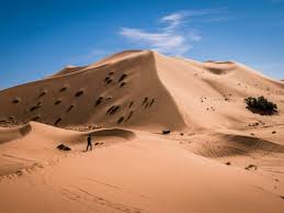 The merzouga desert is the most impressive part of morocco's sahara desert and it is exactly like what you imagine when thinking of a desert, with beautiful reddish yellow undulating dunes. How To Plan A Desert Trip To Merzouga And Fun Things To Do In The Desert In Morocco