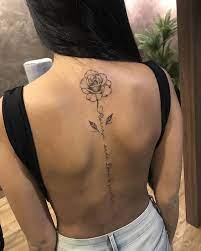 The rose on the twisted branch for the arm. Pin By Abby Petrangelo On Tattoo Spine Tattoos For Women Back Tattoo Women Tattoos