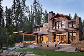 Dine on the lakefront terrace. This Mountain Modern Lakefront Home In Montana Is All About Zen