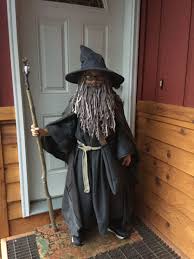 Use scissors to carefully cut the curved line you drew on the construction paper. Homemade Gandalf Kids Costume Wizard Costume For Kids Fancy Dress For Kids Wizard Costume