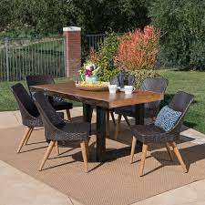 To enhance the look, place the table under a pergola and add patio shades to increase comfort while you enjoy dinner al fresco. 30 Patio Dining Sets For The Best Outdoor Get Togethers Yet Insteading