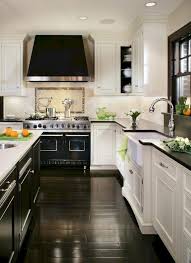 white cabinets with black countertops