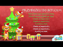 Prezentujemy teksty popularnych kolęd bożonarodzeniowych i chwyty na gitarę. Przybiezeli Do Betlejem Polskie Koledy Tekst Karaoke Youtube