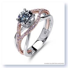 The outermost halo is 18k white gold aglow with colorless diamonds. 18k White Rose Gold Crossover Diamond Engagement Ring