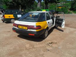 Image result for Yellow 1990 Taxi