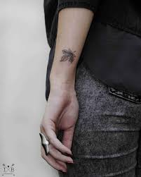 However, you can easily flaunt your side tattoo on the side part of the human body provides a sufficiently large canvas for complex and detailed tattoo designs. Side Wrist Tattoo Entertainmentmesh