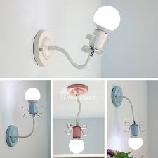 Well you're in luck, because here they come. Small Wall Sconces Nursery Pink Blue Black Bowtie Wrought Iron Cute