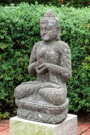 Although he carries few possessions, he is a representation of contentment and prosperity. Stone Buddha Garden Statue
