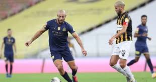 وكان المغربي نور الدين أمريكا قد انضم إلى فريق النصر السعودي في صيف 2018، حيث مثله في 3 مواسم. Ù†ÙˆØ± Ø§Ù„Ø¯ÙŠÙ† Ø¥Ù…Ø±Ø§Ø¨Ø· ÙŠØµØ¯Ù… Ø§Ù„Ù†ØµØ± Ø§Ù„Ø³Ø¹ÙˆØ¯ÙŠ Ù‚Ø¨Ù„ Ù…ÙˆØ§Ø¬Ù‡Ø§Øª Ø¯ÙˆØ±Ù‰ Ø£Ø¨Ø·Ø§Ù„ Ø£Ø³ÙŠØ§ Ø§Ù„ÙŠÙˆÙ… Ø§Ù„Ø³Ø§Ø¨Ø¹