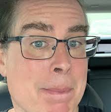 Does anyone know which elementary school Andy Reid attended? Also at what  hospital did his mother work at?