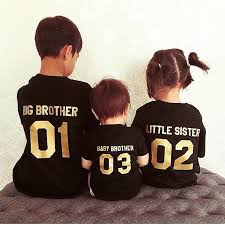 Amazed little sister and brother look inside of carton package showing joy and surprise on their faces. Big Brother Little Sister Baby Brother Matching Kids Shirts