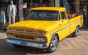 Image result for Bright Yellow 1990 Truck