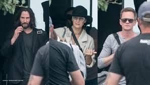 'i have not been invited'. Keanu Reeves Carrie Anne Moss Neil Patrick Harris Return To Shoot The Matrix 4 In Berlin