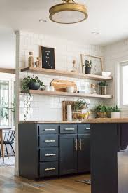 We had our floating shelves custom made along with our lower cabinets, but they were still cheaper than upper cabinets! Open Shelving Better Than Upper Cabinets Pros Vs Cons Floating Shelves Kitchen New Kitchen Cabinets Kitchen Style