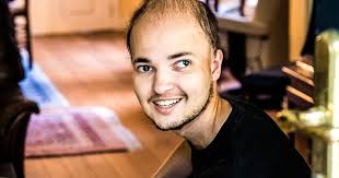 Ex-kankerpatiënt Pieter Swinnen (20), zoon van kankeronderzoeker Johan  Swinnen (51)