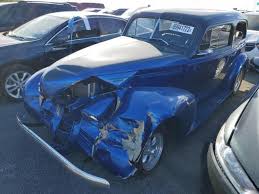 Image result for Trojan Maroon 1939 Oldsmobile