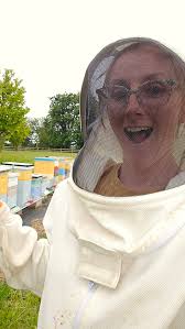 The bees were showing their love today, Mike Claussen had his hands full